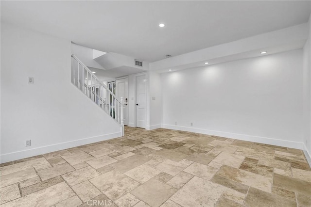 334 Tours Ln, Costa Mesa, CA 92627 - basement featuring stone tile flooring, stairs, and recessed lighting