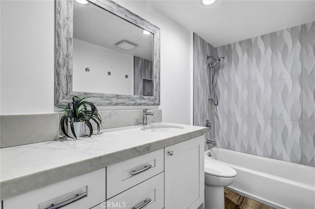 334 Tours Ln, Costa Mesa, CA 92627 - full bathroom with vanity, tub / shower combination, wood finished floors, and recessed lighting