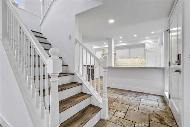 334 Tours Ln, Costa Mesa, CA 92627 - staircase with stone tile flooring and recessed lighting