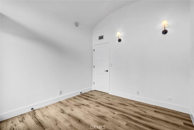 334 Tours Ln, Costa Mesa, CA 92627 - unfurnished room featuring wood finished floors and lofted ceiling