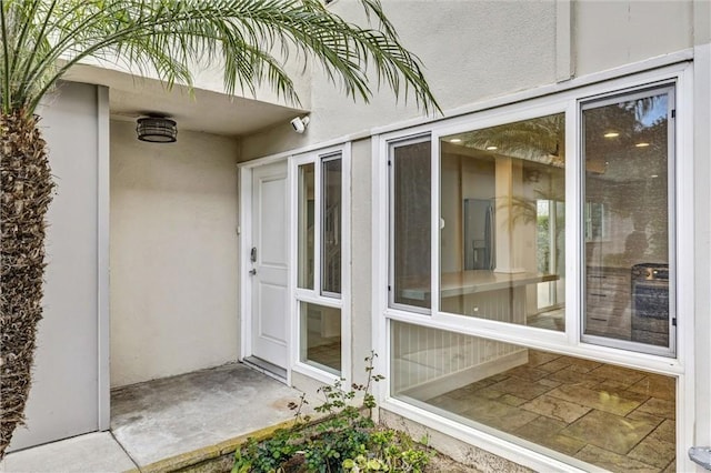 334 Tours Ln, Costa Mesa, CA 92627 - view of exterior entry with stucco siding