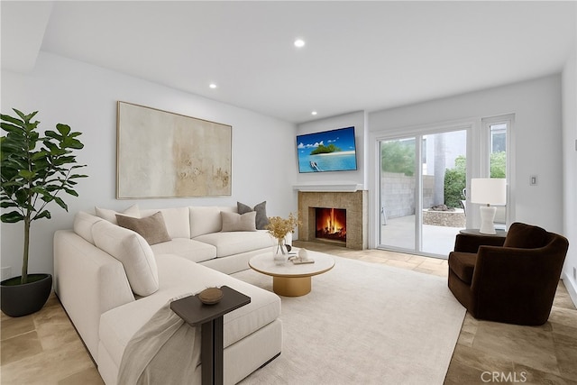 334 Tours Ln, Costa Mesa, CA 92627 - living room with recessed lighting and a lit fireplace