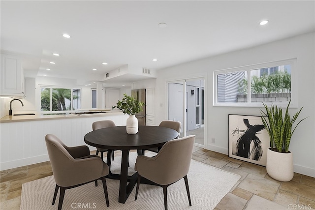 334 Tours Ln, Costa Mesa, CA 92627 - dining space featuring stone tile floors and recessed lighting