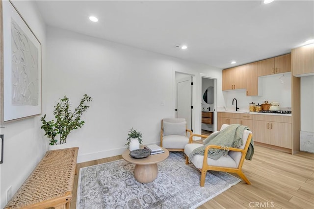 8519 Wakefield Ave, Panorama City, CA 91402 - sitting room featuring baseboards, recessed lighting, and light wood-style floors