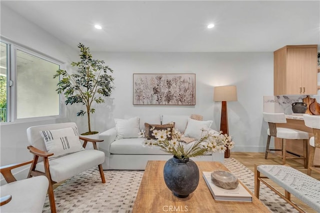 8519 Wakefield Ave, Panorama City, CA 91402 - living room with recessed lighting, light wood-style flooring, and baseboards