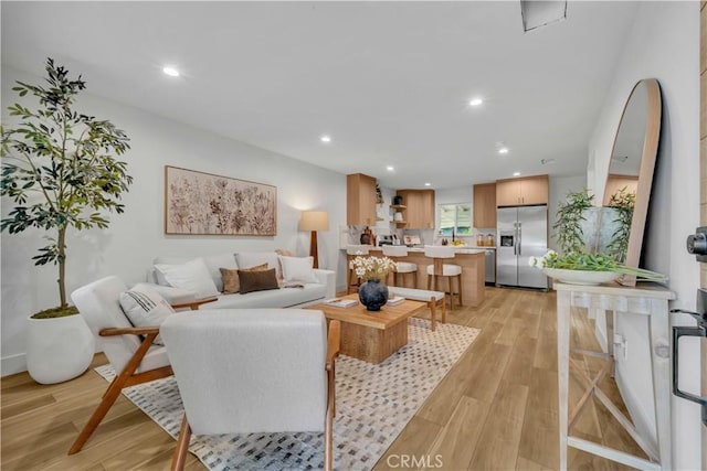 8519 Wakefield Ave, Panorama City, CA 91402 - living area featuring recessed lighting and light wood-type flooring