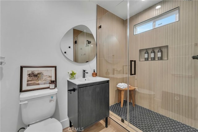 8519 Wakefield Ave, Panorama City, CA 91402 - bathroom featuring a shower stall, toilet, and vanity