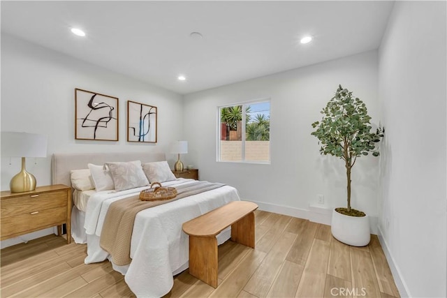 8519 Wakefield Ave, Panorama City, CA 91402 - bedroom featuring light wood-style flooring, baseboards, and recessed lighting