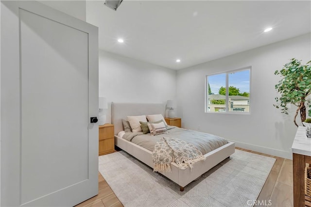 8519 Wakefield Ave, Panorama City, CA 91402 - bedroom featuring light wood finished floors, baseboards, and recessed lighting