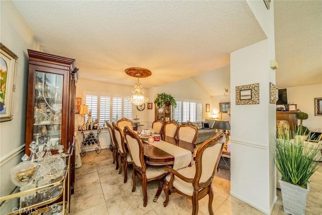9527 Manzanita Dr, Rancho Cucamonga, CA 91737 - dining room with vaulted ceiling, a textured ceiling, a notable chandelier, and light tile patterned flooring