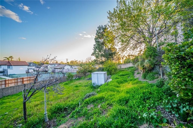 9527 Manzanita Dr, Rancho Cucamonga, CA 91737 - view of yard featuring a residential view and fence
