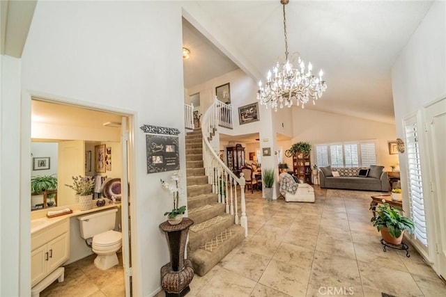 9527 Manzanita Dr, Rancho Cucamonga, CA 91737 - foyer entrance featuring high vaulted ceiling, a chandelier, and stairway