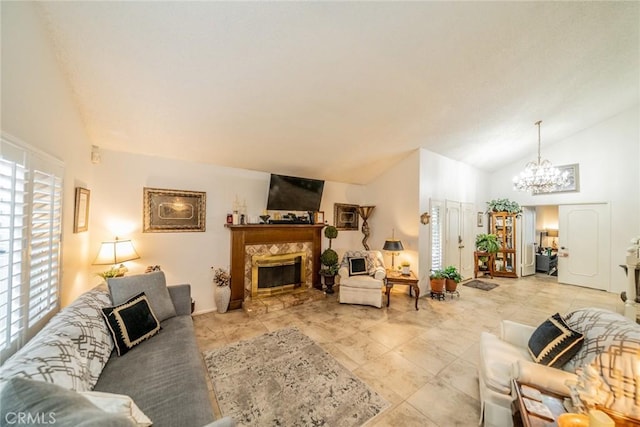 9527 Manzanita Dr, Rancho Cucamonga, CA 91737 - living area with a high end fireplace, vaulted ceiling, and a chandelier