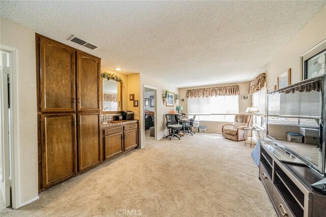 9527 Manzanita Dr, Rancho Cucamonga, CA 91737 - interior space with a textured ceiling, visible vents, and light carpet