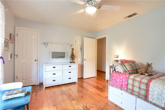 41820 Dillon Cir, Ahwahnee, CA 93601 - bedroom with light wood-type flooring and a ceiling fan