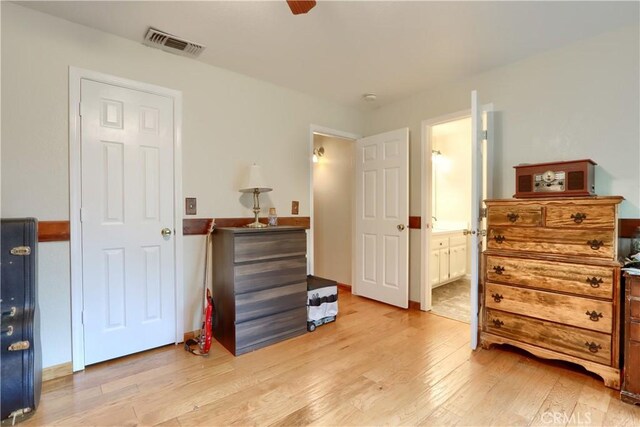 41820 Dillon Cir, Ahwahnee, CA 93601 - bedroom featuring light wood-style floors, ensuite bathroom, and a ceiling fan