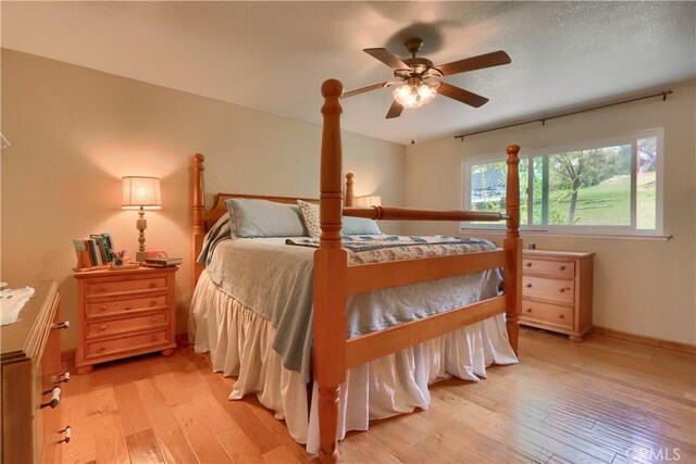 41820 Dillon Cir, Ahwahnee, CA 93601 - bedroom with light wood-type flooring, ceiling fan, and baseboards