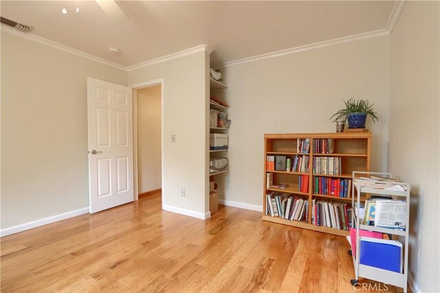 41820 Dillon Cir, Ahwahnee, CA 93601 - sitting room featuring ornamental molding, wood finished floors, and baseboards