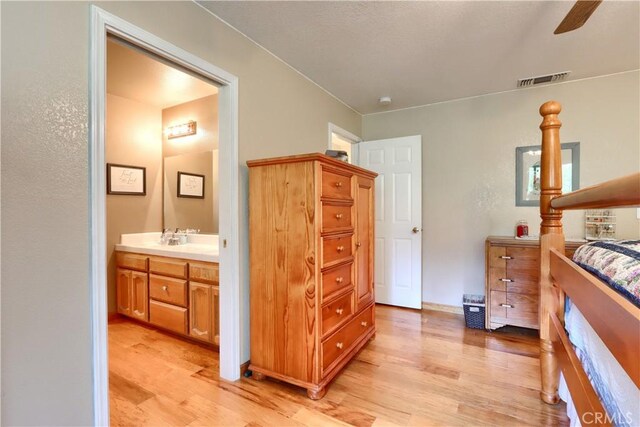 41820 Dillon Cir, Ahwahnee, CA 93601 - bedroom featuring light wood-type flooring and ensuite bathroom