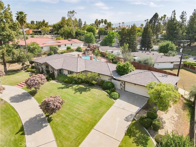 birds eye view of property with a residential view