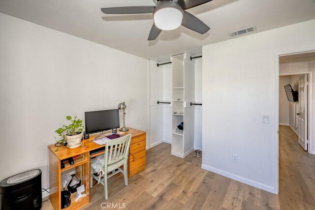 6030 Treehaven Ct, Lancaster, CA 93536 - office space featuring wood finished floors, ceiling fan, and baseboards