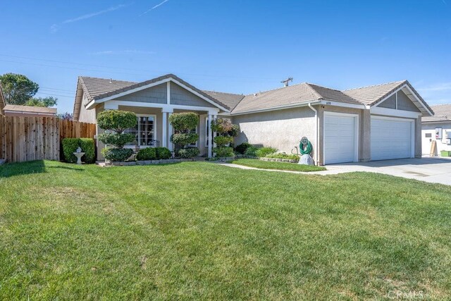 6030 Treehaven Ct, Lancaster, CA 93536 - single story home with an attached garage, a tile roof, driveway, and stucco siding