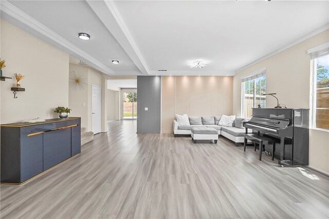 13608 Sagemont Ct, Eastvale, CA 92880 - living area featuring light wood finished floors and ornamental molding