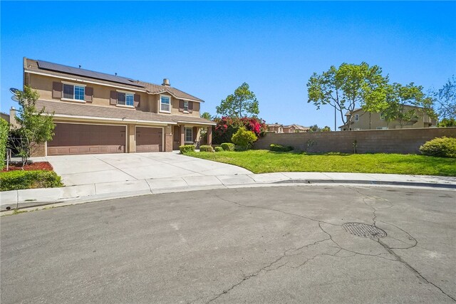 13608 Sagemont Ct, Eastvale, CA 92880 - traditional-style home featuring stucco siding, roof mounted solar panels, concrete driveway, a chimney, and a garage