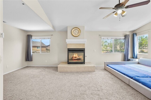 13608 Sagemont Ct, Eastvale, CA 92880 - carpeted bedroom with a tiled fireplace, a ceiling fan, and lofted ceiling