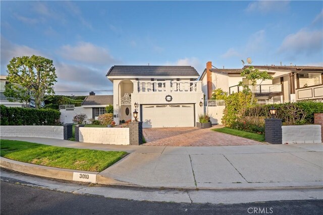 3010 Stoner Ave, Los Angeles, CA 90066 - view of front of home featuring fence, decorative driveway, and stucco siding