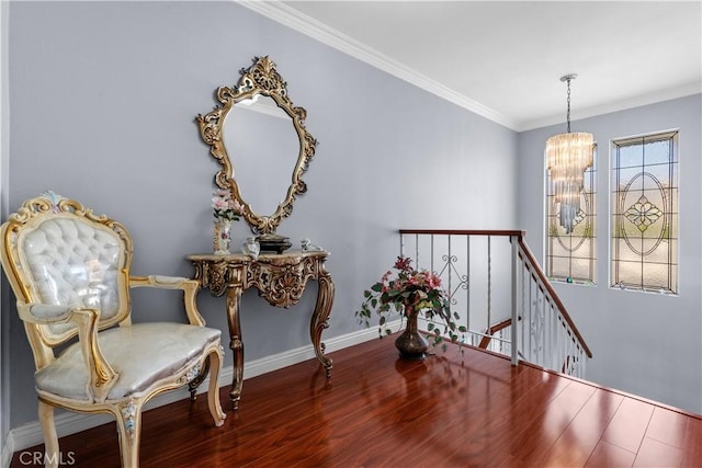 3010 Stoner Ave, Los Angeles, CA 90066 - living area with crown molding, an upstairs landing, wood finished floors, an inviting chandelier, and baseboards