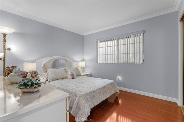 3010 Stoner Ave, Los Angeles, CA 90066 - bedroom with wood finished floors, baseboards, and ornamental molding