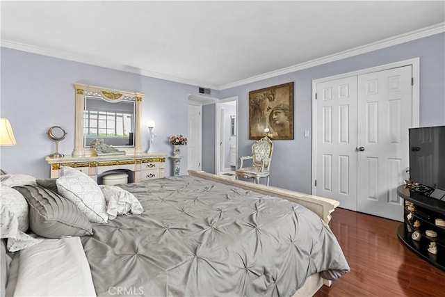 3010 Stoner Ave, Los Angeles, CA 90066 - bedroom with a closet, wood finished floors, visible vents, and ornamental molding