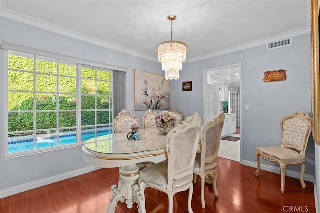 3010 Stoner Ave, Los Angeles, CA 90066 - dining area with baseboards, wood finished floors, visible vents, and an inviting chandelier