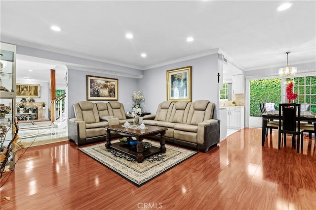 3010 Stoner Ave, Los Angeles, CA 90066 - living room featuring recessed lighting, wood finished floors, and a notable chandelier