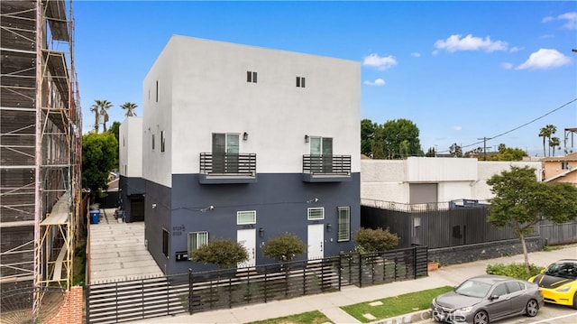 3721 S San Pedro St, Los Angeles, CA 90011 - view of property featuring fence