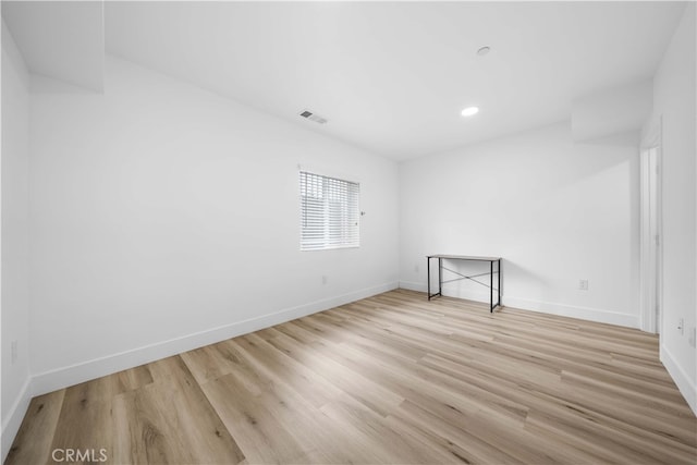 3721 S San Pedro St, Los Angeles, CA 90011 - unfurnished room featuring recessed lighting, wood finished floors, visible vents, and baseboards