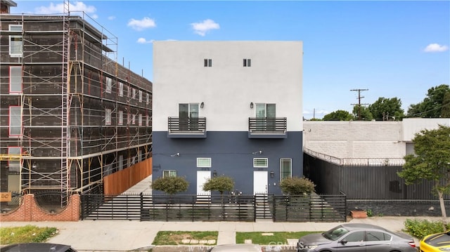 3721 S San Pedro St, Los Angeles, CA 90011 - view of building exterior featuring fence