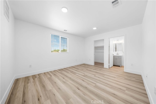 3721 S San Pedro St, Los Angeles, CA 90011 - unfurnished bedroom featuring baseboards and visible vents