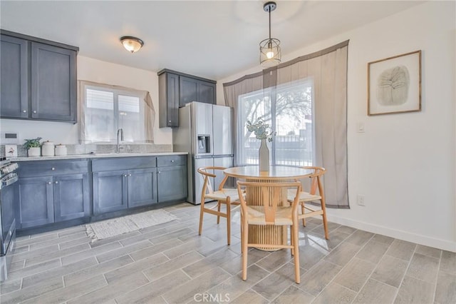 dining area featuring wood finish floors and baseboards