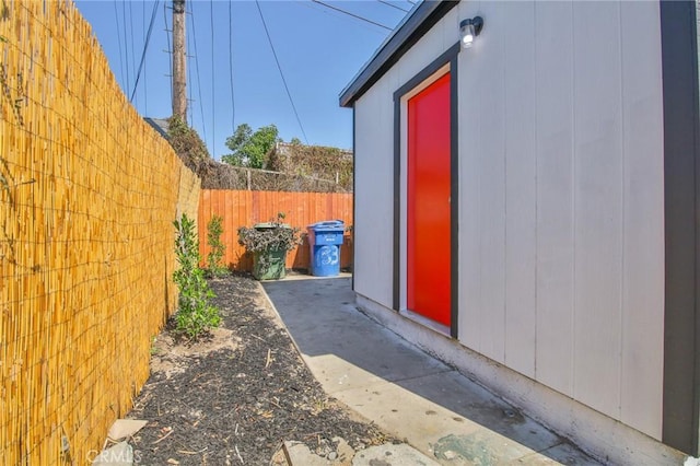 view of property exterior with fence