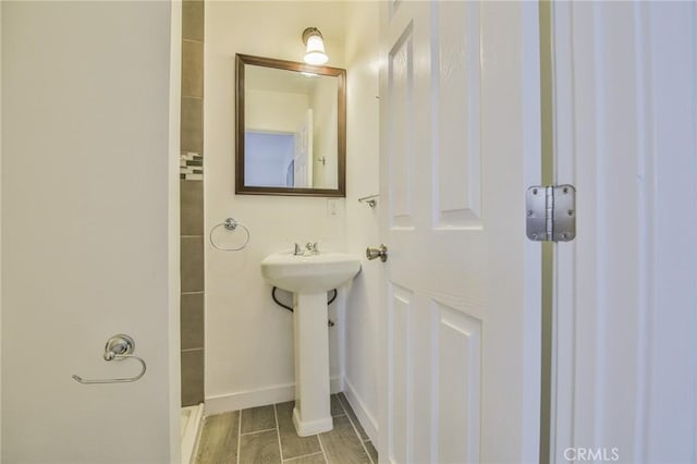 bathroom featuring baseboards