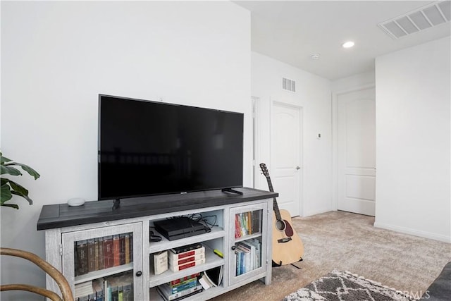 interior space featuring visible vents, recessed lighting, baseboards, and carpet floors