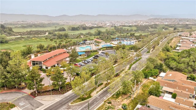 birds eye view of property featuring a mountain view