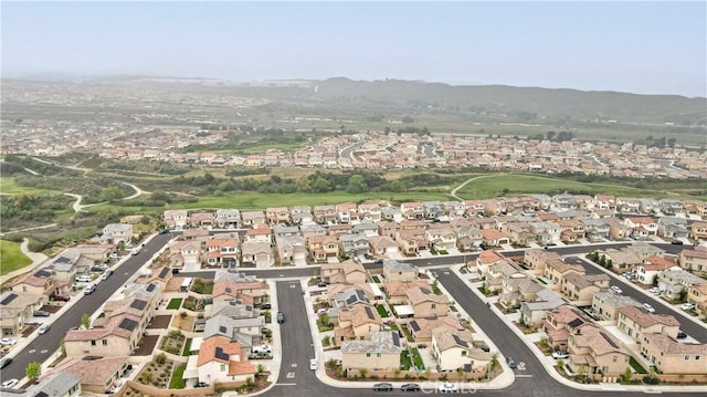 bird's eye view featuring a mountain view and a residential view