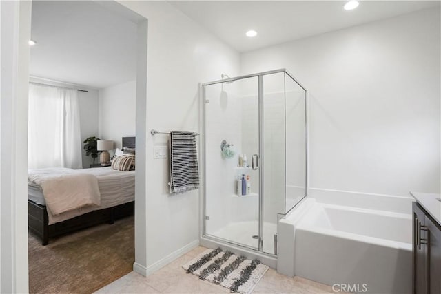 bathroom with a garden tub, recessed lighting, connected bathroom, and a shower stall