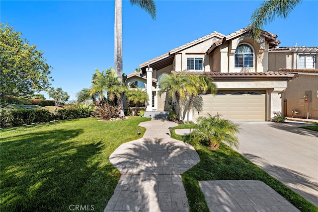 mediterranean / spanish house featuring a garage, a tile roof, driveway, and stucco siding