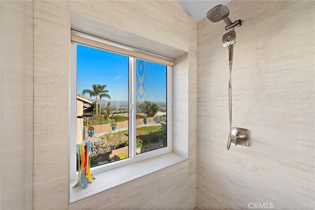 room details featuring tiled shower