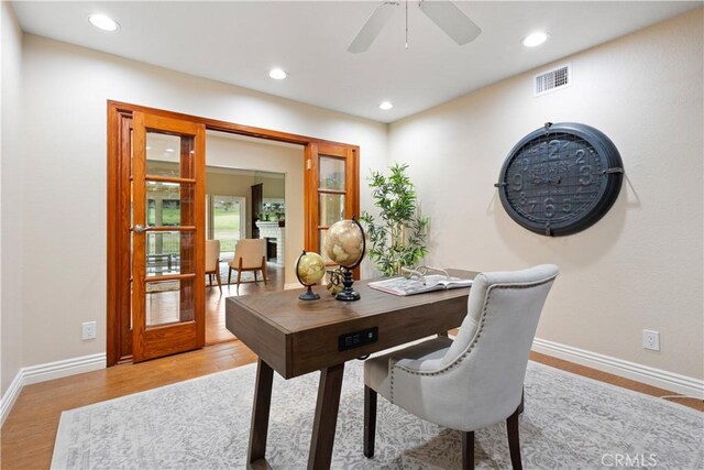 1061 Pebble Beach Dr, Upland, CA 91784 - home office featuring baseboards, visible vents, light wood-type flooring, and ceiling fan