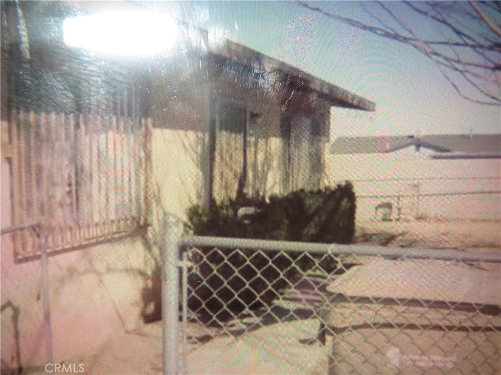 17019 Olive St, Hesperia, CA 92345 - view of side of home with fence